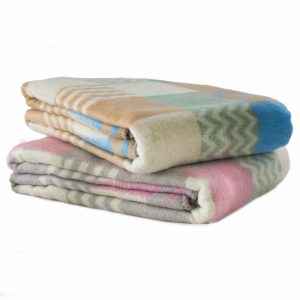 L'aspetto estetico è essenziale quando si scelgono le coperte di lana. In tal senso una coperta a quadri rappresenta la scelta più classica che si possa fare.